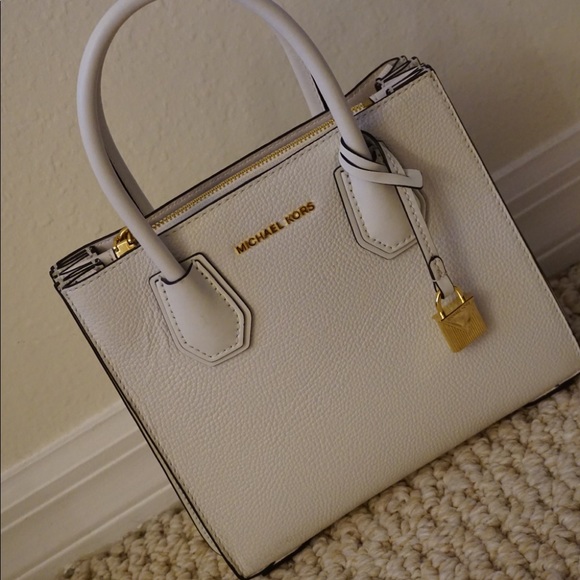 Michael Kors Handbags - Michael Kors White Mini (accordion style) handbag